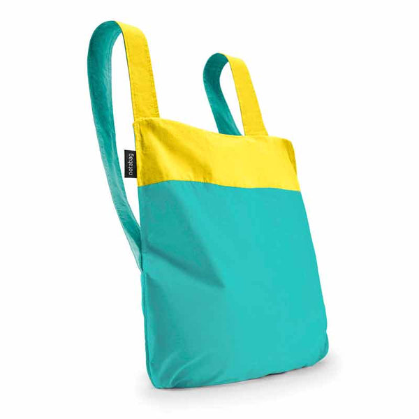 Notabag Yellow & Mint 2 in 1 back and backpack shown as backpack