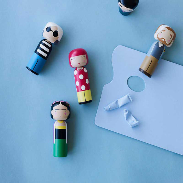 Sketch Inc. for Lucie Kaas modern wooden kokeshi doll as Andy Warhol shown with other dolls Frida and Van Gough