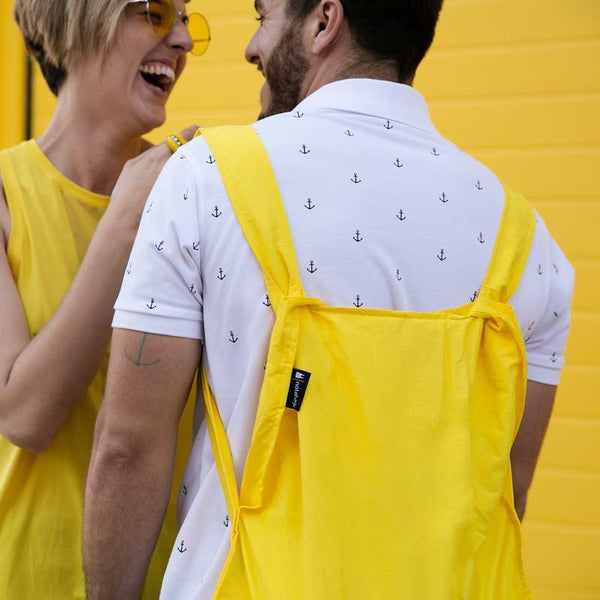Notabag Yellow 2 in one tote bag and backpack shown on mans back